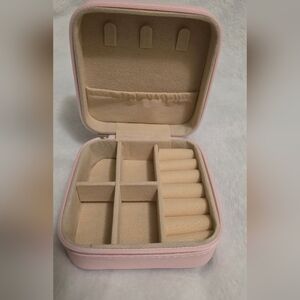 Compact Pink Jewelry Organizer Case with Cream Interior